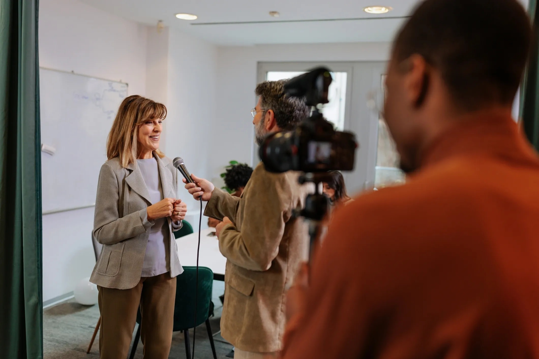 Executive presenting confidently in a professional setting